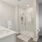 Luxurious bathroom features modern, coastal hardware 