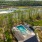 The pool pavilion is set idyllically against the marsh backdrop